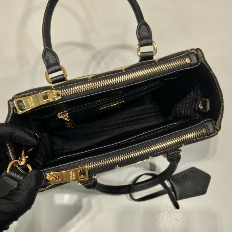 Pra*a top handle bags